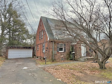 60 Hubbard Rd. offers a solid opportunity for buyers, investors on Goodwin Golf Course in Connecticut - for sale on GolfHomes.com, golf home, golf lot