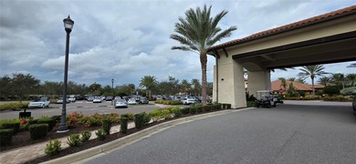 This beautifully updated second-floor home in Esplanade Lakewood on Esplanade Golf and Country at Lakewood Ranch in Florida - for sale on GolfHomes.com, golf home, golf lot
