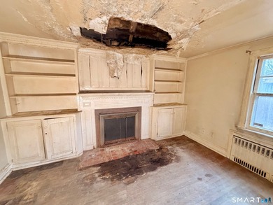 60 Hubbard Rd. offers a solid opportunity for buyers, investors on Goodwin Golf Course in Connecticut - for sale on GolfHomes.com, golf home, golf lot