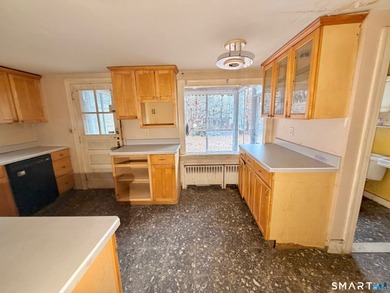 60 Hubbard Rd. offers a solid opportunity for buyers, investors on Goodwin Golf Course in Connecticut - for sale on GolfHomes.com, golf home, golf lot