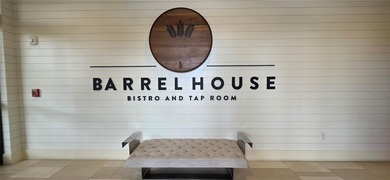 This beautifully updated second-floor home in Esplanade Lakewood on Esplanade Golf and Country at Lakewood Ranch in Florida - for sale on GolfHomes.com, golf home, golf lot