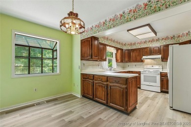Charming home located in the gated and golf community of on Carolina Trace Country Club in North Carolina - for sale on GolfHomes.com, golf home, golf lot