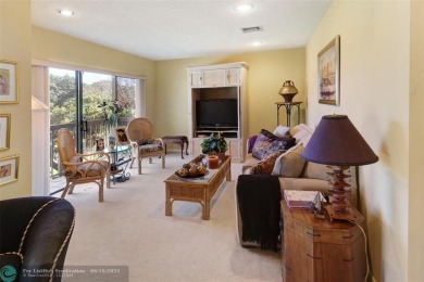 Not to be missed bright and airy upstairs 2-bedroom 2 bath unit on Fountains Golf and Country Club in Florida - for sale on GolfHomes.com, golf home, golf lot