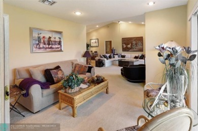 Not to be missed bright and airy upstairs 2-bedroom 2 bath unit on Fountains Golf and Country Club in Florida - for sale on GolfHomes.com, golf home, golf lot