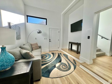 This ultra-modern home overlooks Bear Lake with 5 bedrooms, 4 on Bear Lake Golf Course in Utah - for sale on GolfHomes.com, golf home, golf lot