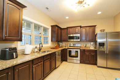 Welcome home to this beautifully cared-for property in the White on Pine Hill Country Club in Alabama - for sale on GolfHomes.com, golf home, golf lot