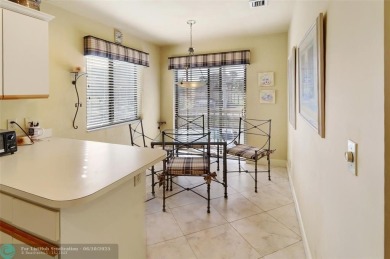 Not to be missed bright and airy upstairs 2-bedroom 2 bath unit on Fountains Golf and Country Club in Florida - for sale on GolfHomes.com, golf home, golf lot