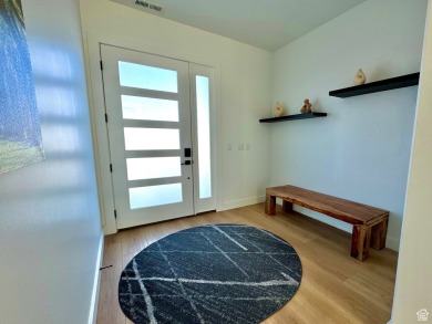 This ultra-modern home overlooks Bear Lake with 5 bedrooms, 4 on Bear Lake Golf Course in Utah - for sale on GolfHomes.com, golf home, golf lot