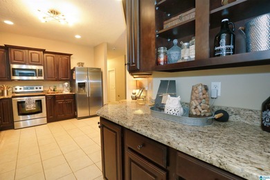 Welcome home to this beautifully cared-for property in the White on Pine Hill Country Club in Alabama - for sale on GolfHomes.com, golf home, golf lot