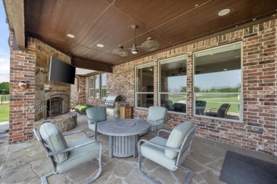 Lakefront Luxury Retreat on Eagle Mountain Lake. Experience the on The Golf Club at Resort Eagle Mountain Lake in Texas - for sale on GolfHomes.com, golf home, golf lot