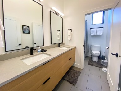 This ultra-modern home overlooks Bear Lake with 5 bedrooms, 4 on Bear Lake Golf Course in Utah - for sale on GolfHomes.com, golf home, golf lot