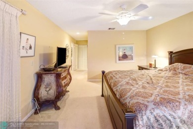 Not to be missed bright and airy upstairs 2-bedroom 2 bath unit on Fountains Golf and Country Club in Florida - for sale on GolfHomes.com, golf home, golf lot