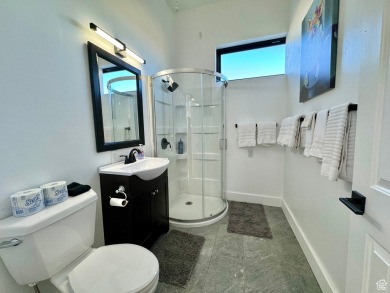This ultra-modern home overlooks Bear Lake with 5 bedrooms, 4 on Bear Lake Golf Course in Utah - for sale on GolfHomes.com, golf home, golf lot