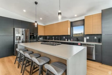 This ultra-modern home overlooks Bear Lake with 5 bedrooms, 4 on Bear Lake Golf Course in Utah - for sale on GolfHomes.com, golf home, golf lot