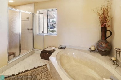 Not to be missed bright and airy upstairs 2-bedroom 2 bath unit on Fountains Golf and Country Club in Florida - for sale on GolfHomes.com, golf home, golf lot