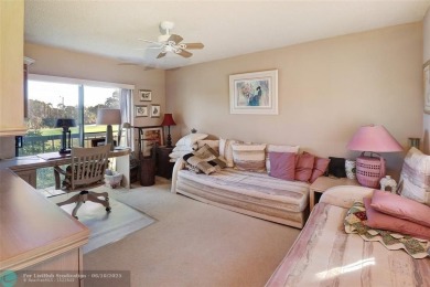 Not to be missed bright and airy upstairs 2-bedroom 2 bath unit on Fountains Golf and Country Club in Florida - for sale on GolfHomes.com, golf home, golf lot
