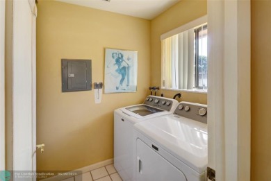 Not to be missed bright and airy upstairs 2-bedroom 2 bath unit on Fountains Golf and Country Club in Florida - for sale on GolfHomes.com, golf home, golf lot