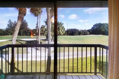 Not to be missed bright and airy upstairs 2-bedroom 2 bath unit on Fountains Golf and Country Club in Florida - for sale on GolfHomes.com, golf home, golf lot