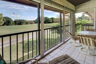 Not to be missed bright and airy upstairs 2-bedroom 2 bath unit on Fountains Golf and Country Club in Florida - for sale on GolfHomes.com, golf home, golf lot