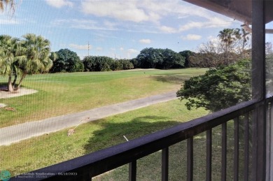 Not to be missed bright and airy upstairs 2-bedroom 2 bath unit on Fountains Golf and Country Club in Florida - for sale on GolfHomes.com, golf home, golf lot