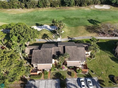 Not to be missed bright and airy upstairs 2-bedroom 2 bath unit on Fountains Golf and Country Club in Florida - for sale on GolfHomes.com, golf home, golf lot