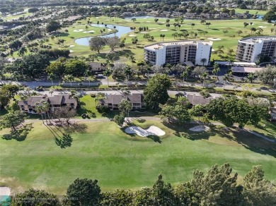 Not to be missed bright and airy upstairs 2-bedroom 2 bath unit on Fountains Golf and Country Club in Florida - for sale on GolfHomes.com, golf home, golf lot
