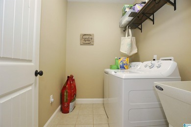 Welcome home to this beautifully cared-for property in the White on Pine Hill Country Club in Alabama - for sale on GolfHomes.com, golf home, golf lot