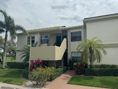 Beautifully updated second floor condo offers sweeping golf on Old Marsh Golf Club in Florida - for sale on GolfHomes.com, golf home, golf lot