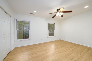 Enjoy being minutes from everything Sandy Springs has to offer on Steel Canyon Golf Club in Georgia - for sale on GolfHomes.com, golf home, golf lot