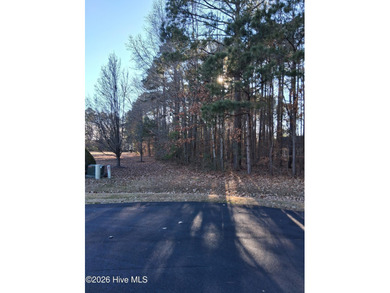 Beautiful wooded over half acre mostly level homesite at the on Sound Golf Links at Albemarle Plantation in North Carolina - for sale on GolfHomes.com, golf home, golf lot