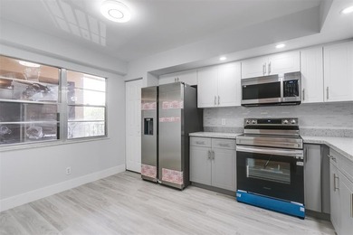 Updated 2 bedroom, 2 bath condo in Century Village in excellent on Flamingo Lakes Country Club in Florida - for sale on GolfHomes.com, golf home, golf lot