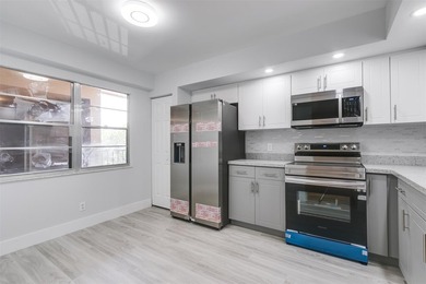 Updated 2 bedroom, 2 bath condo in Century Village in excellent on Flamingo Lakes Country Club in Florida - for sale on GolfHomes.com, golf home, golf lot