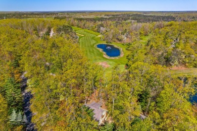 Tucked along the fairways of Garland's Fountains Course, 829 on Garland Resort and Golf Club  in Michigan - for sale on GolfHomes.com, golf home, golf lot
