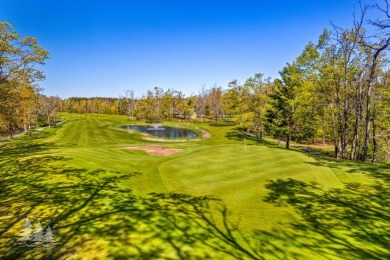 Tucked along the fairways of Garland's Fountains Course, 829 on Garland Resort and Golf Club  in Michigan - for sale on GolfHomes.com, golf home, golf lot