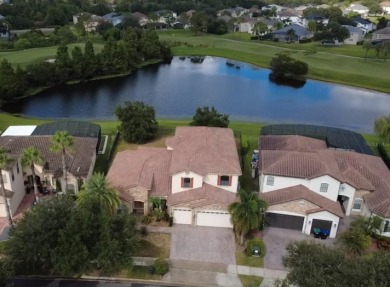 Discover this impressive two-story residence in the highly on Eagle Creek Golf Club in Florida - for sale on GolfHomes.com, golf home, golf lot