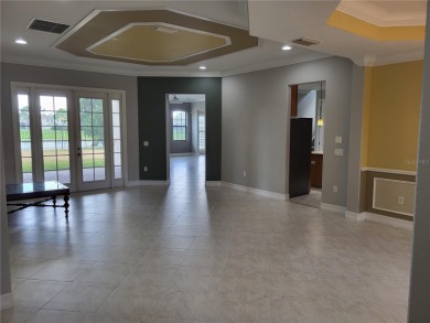 Discover this impressive two-story residence in the highly on Eagle Creek Golf Club in Florida - for sale on GolfHomes.com, golf home, golf lot