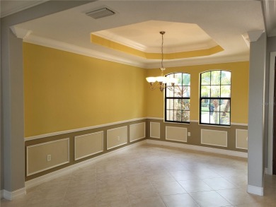Discover this impressive two-story residence in the highly on Eagle Creek Golf Club in Florida - for sale on GolfHomes.com, golf home, golf lot