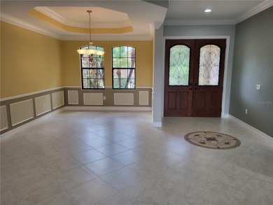 Discover this impressive two-story residence in the highly on Eagle Creek Golf Club in Florida - for sale on GolfHomes.com, golf home, golf lot