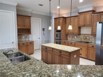 Discover this impressive two-story residence in the highly on Eagle Creek Golf Club in Florida - for sale on GolfHomes.com, golf home, golf lot