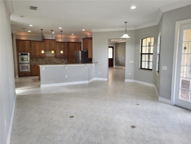 Discover this impressive two-story residence in the highly on Eagle Creek Golf Club in Florida - for sale on GolfHomes.com, golf home, golf lot