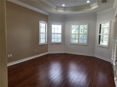 Discover this impressive two-story residence in the highly on Eagle Creek Golf Club in Florida - for sale on GolfHomes.com, golf home, golf lot