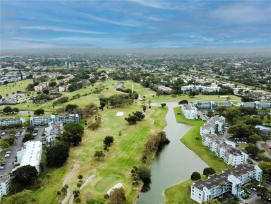 Gorgeous and completely renovated 2 bedroom, 2 bath apartment in on Oriole Golf and Tennis Club in Florida - for sale on GolfHomes.com, golf home, golf lot