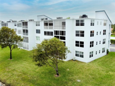 Gorgeous and completely renovated 2 bedroom, 2 bath apartment in on Oriole Golf and Tennis Club in Florida - for sale on GolfHomes.com, golf home, golf lot