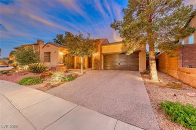 This beautiful single-story home is perched at the summit of the on  in Nevada - for sale on GolfHomes.com, golf home, golf lot