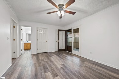 This inviting two-bedroom, two-bath townhome combines comfort on Smithfields Country Club in South Carolina - for sale on GolfHomes.com, golf home, golf lot