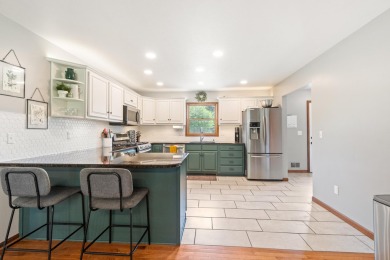 Beautiful Ranch home in Northwest Schools with lake access to on Hankerd Hills Golf Course in Michigan - for sale on GolfHomes.com, golf home, golf lot