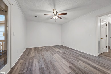 This inviting two-bedroom, two-bath townhome combines comfort on Smithfields Country Club in South Carolina - for sale on GolfHomes.com, golf home, golf lot