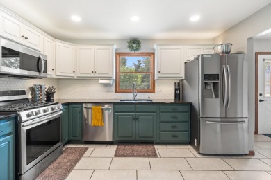 Beautiful Ranch home in Northwest Schools with lake access to on Hankerd Hills Golf Course in Michigan - for sale on GolfHomes.com, golf home, golf lot