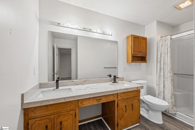 This inviting two-bedroom, two-bath townhome combines comfort on Smithfields Country Club in South Carolina - for sale on GolfHomes.com, golf home, golf lot