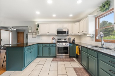 Beautiful Ranch home in Northwest Schools with lake access to on Hankerd Hills Golf Course in Michigan - for sale on GolfHomes.com, golf home, golf lot